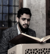 Young Muslim student learning Quran online